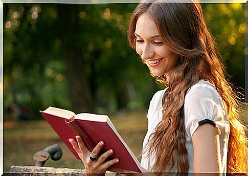 Woman reading a book alone.