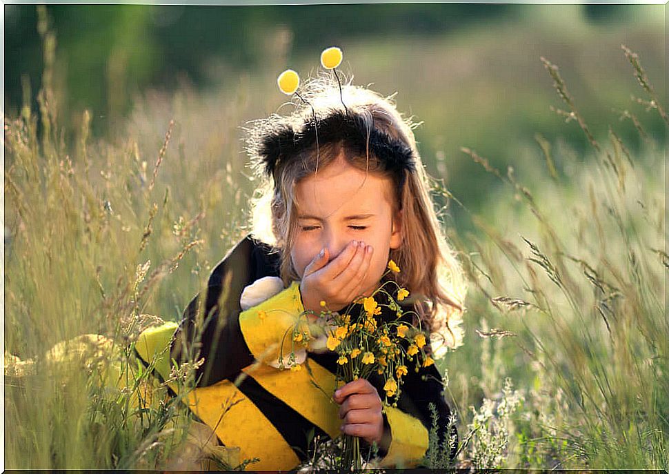 Girl with allergy in the field.