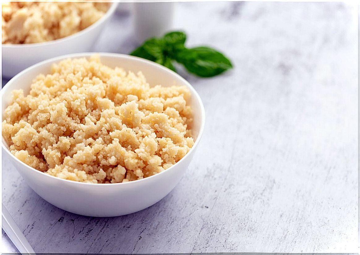 Plate of couscous to mix with vegetables.