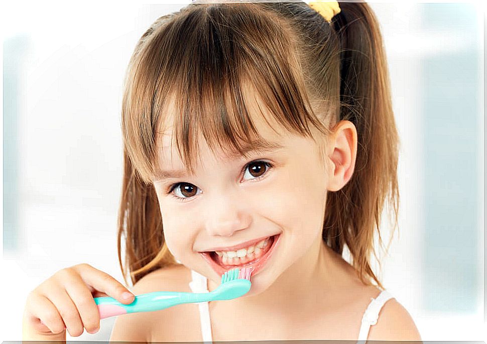 Little girl brushing her teeth.